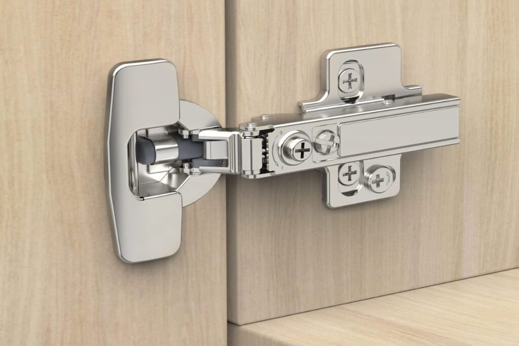 "Close-up of a hidden cabinet hinges showing a concealed, soft-closing mechanism for smooth operation.