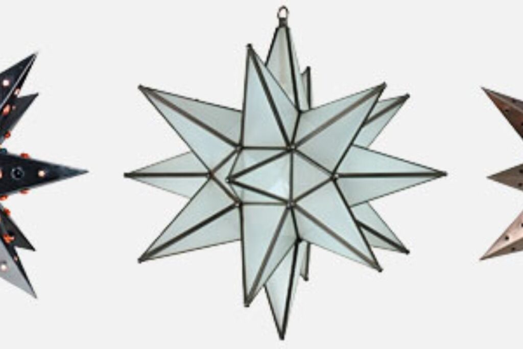 A collection of metal Moravian Star lights with a polished finish, designed to cast striking shadows when lit.